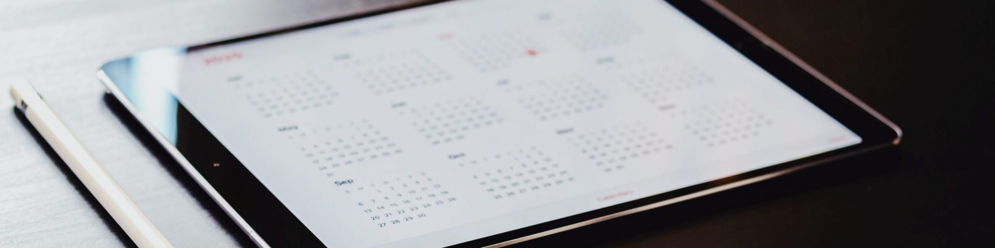 An image of a calendar on a table within music service management software